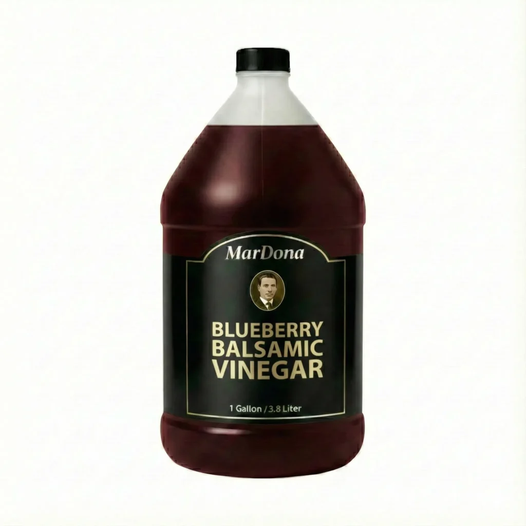 -gallon jug of MarDona Chocolate Balsamic Vinegar featuring a dark liquid and a black label with a vintage portrait.