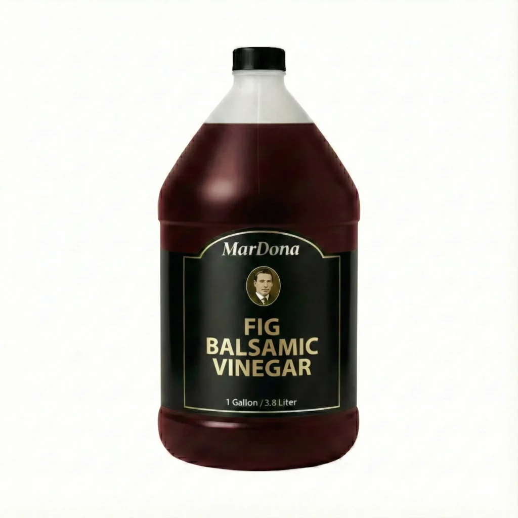 A 1-gallon jug of MarDona Fig Balsamic Vinegar showing a deep, dark purple-brown color.