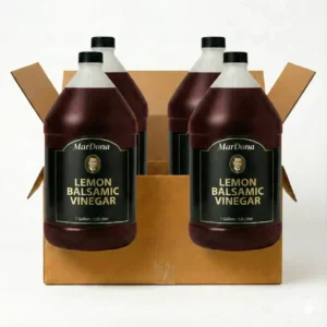 A case of four 1-gallon jugs of MarDona Lemon Balsamic Vinegar, ideal for restaurant and commercial kitchen use.