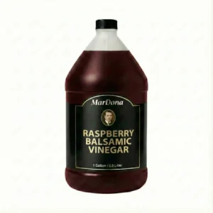 A single 1-gallon (3.8 Liter) plastic jug of MarDona Raspberry Balsamic Vinegar with a black and gold label.