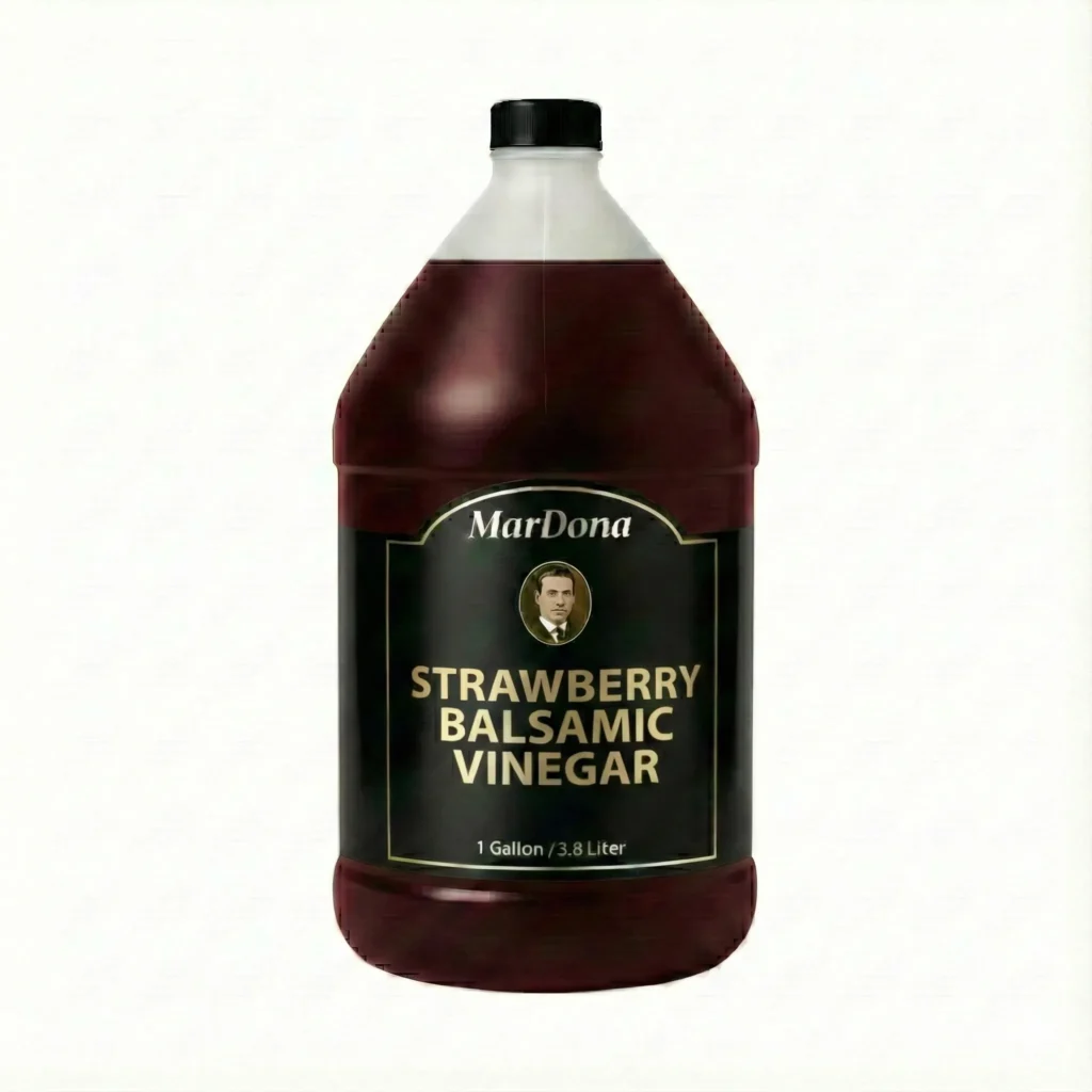 A single 1-gallon (3.8 Liter) plastic jug of MarDona Strawberry Balsamic Vinegar with a black and gold label.