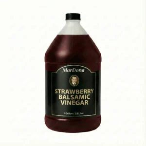 A single 1-gallon (3.8 Liter) plastic jug of MarDona Strawberry Balsamic Vinegar with a black and gold label.